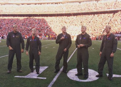 NAS Lemoore fighter pilots and Nebraska, Purdue alums do flyover at football game NAS Lemoore aviators (l to r) Lt. Cmdr. Scott Sabau, Lt. Daniel "Smalls" Brannan, Lt. Matt "Arnie" Langford, Lt. Cmdr. Bill "Tank" Frank, and Lt. Breet "Pete" Mitchell.